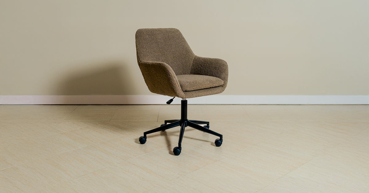 Berria and Zara Home Metal & Leather Armchairs placed together for a design showdown.