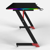 Essentials 140 Gaming Desk | LEDs, Headphone & Drink Mounts (Carbon Fibre Black, 140cm) Gaming Desk - Gaming