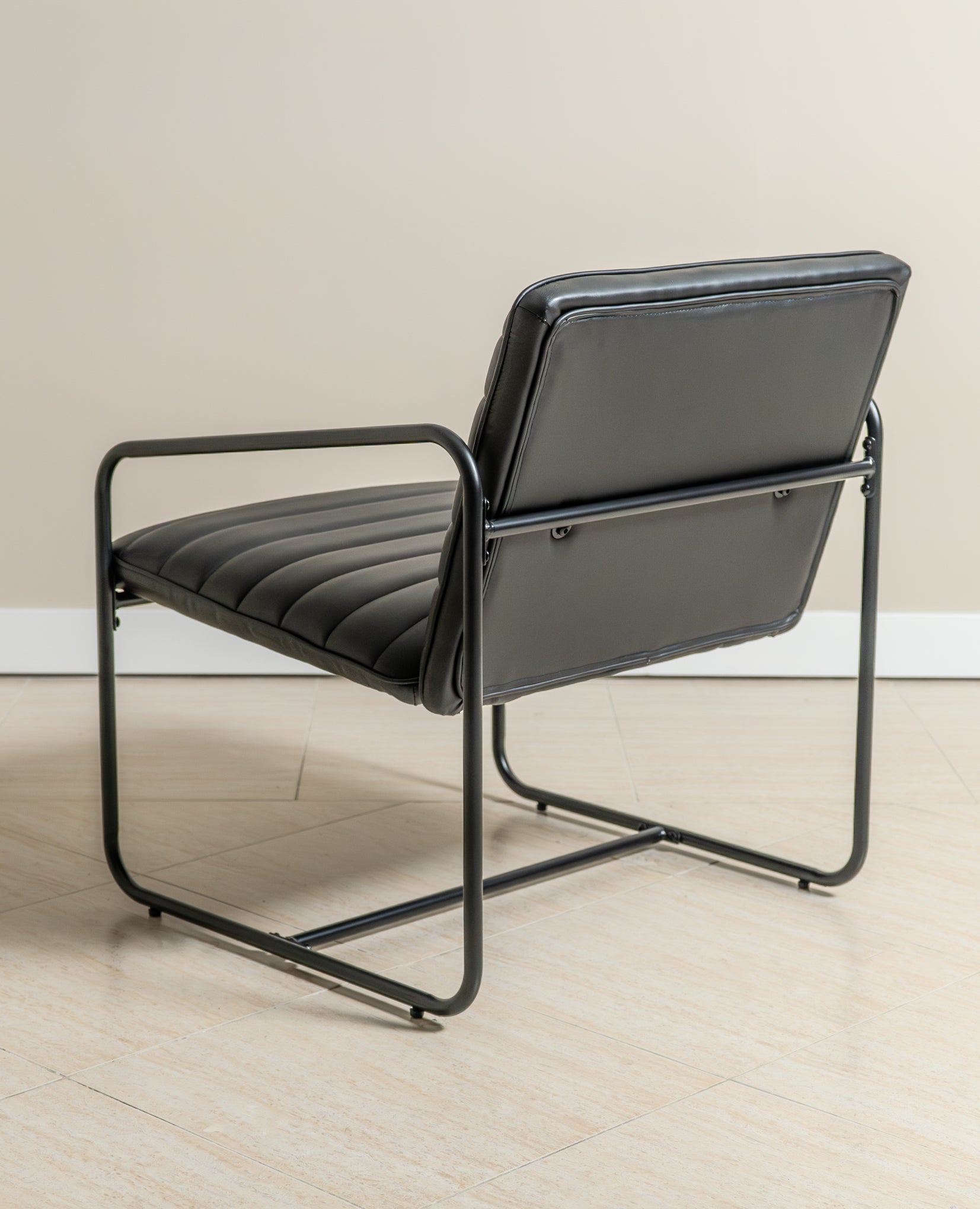 Berria Armchair Metal & Vegan Leather (Ebony Black) – Modern Industrial Ribbed Lounge Chair - Marcel Olsen