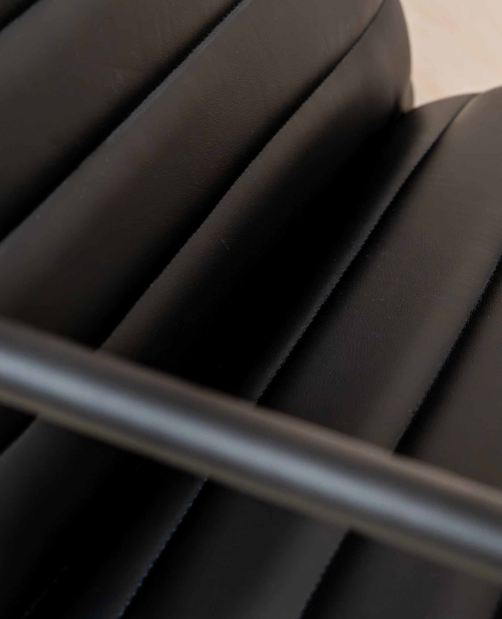Berria Armchair Metal & Vegan Leather (Ebony Black) – Modern Industrial Ribbed Lounge Chair - Marcel Olsen