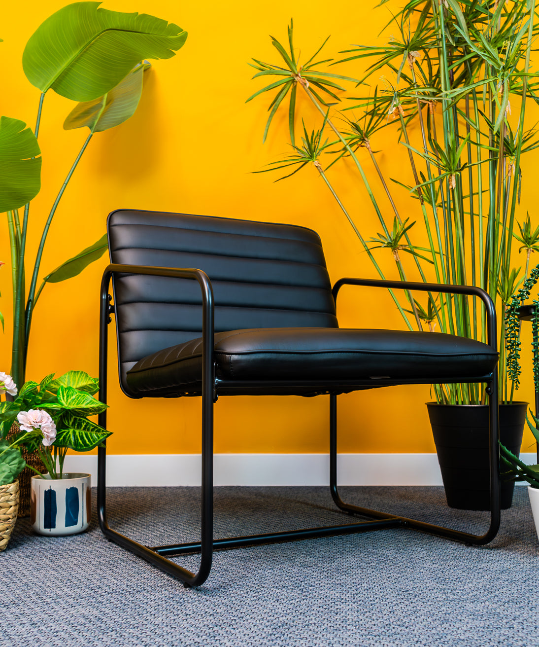 Berria Armchair Metal & Vegan Leather (Ebony Black) – Modern Industrial Ribbed Lounge Chair - Marcel Olsen