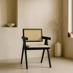 Chiva Rattan & Wood Dining Chair (Ebony) – Rustic Boho Upholstered Chair with Armrests (Outlet) Outlet Products - Marcel Olsen