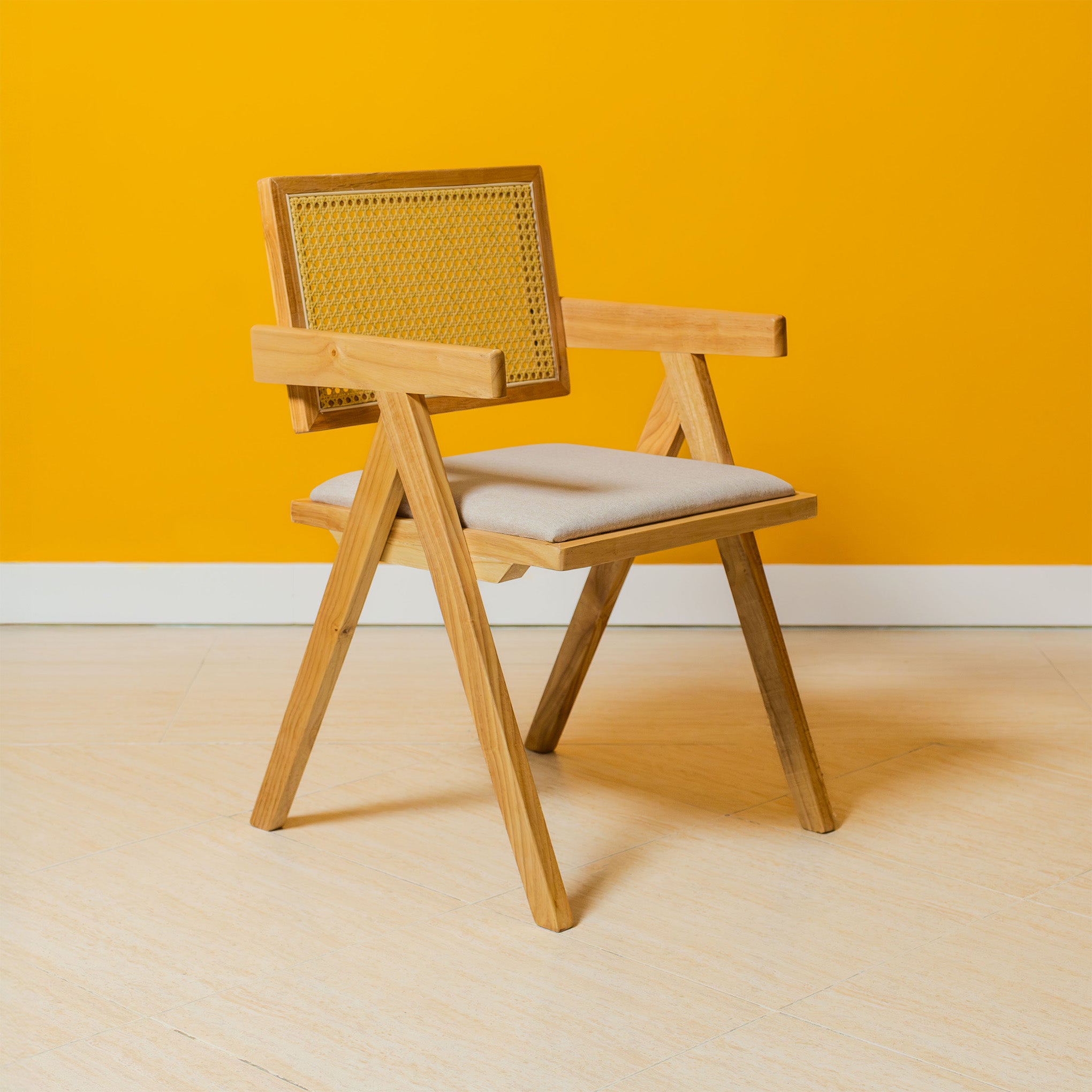 chiva chair yellow wall
