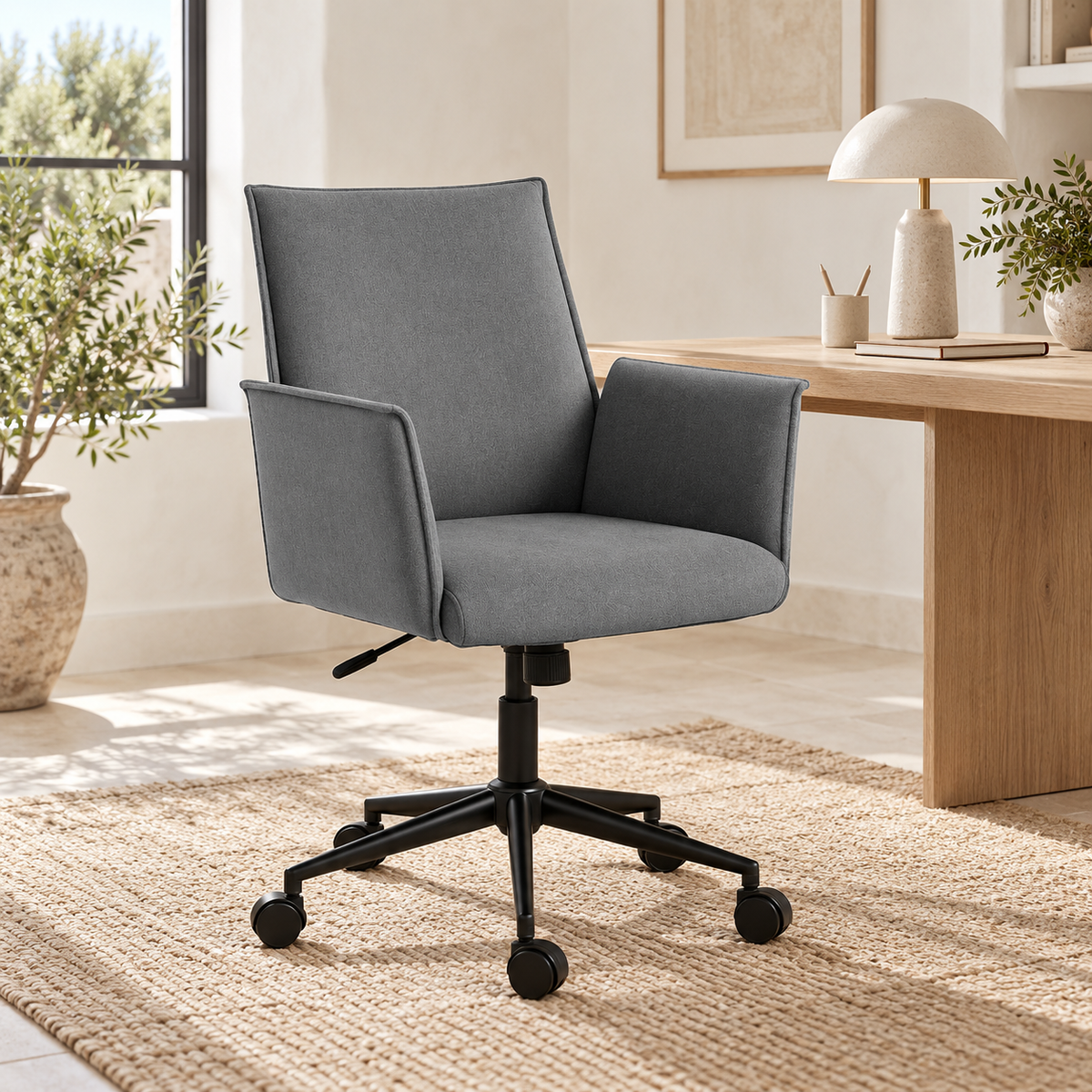 Rello Soft Ash grey fabric office chair beside a light oak desk in a bright home office.
