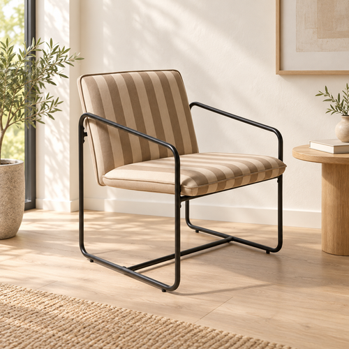 Berria Natural Sand striped armchair with a black metal frame in a bright reading corner