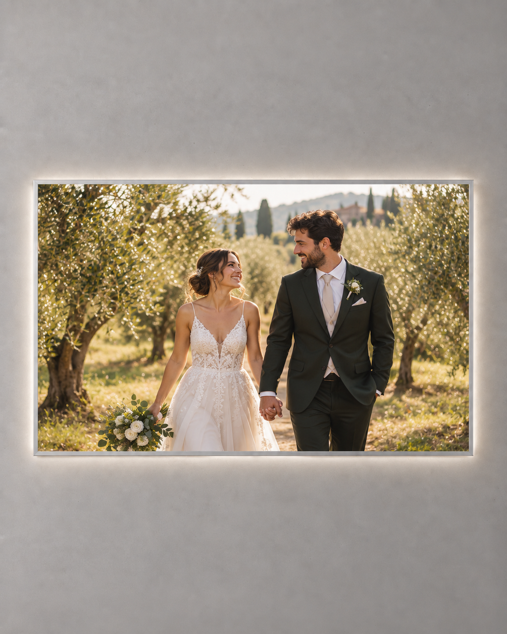 Silver landscape illuminated wedding photo frame displaying a couple in an olive garden
