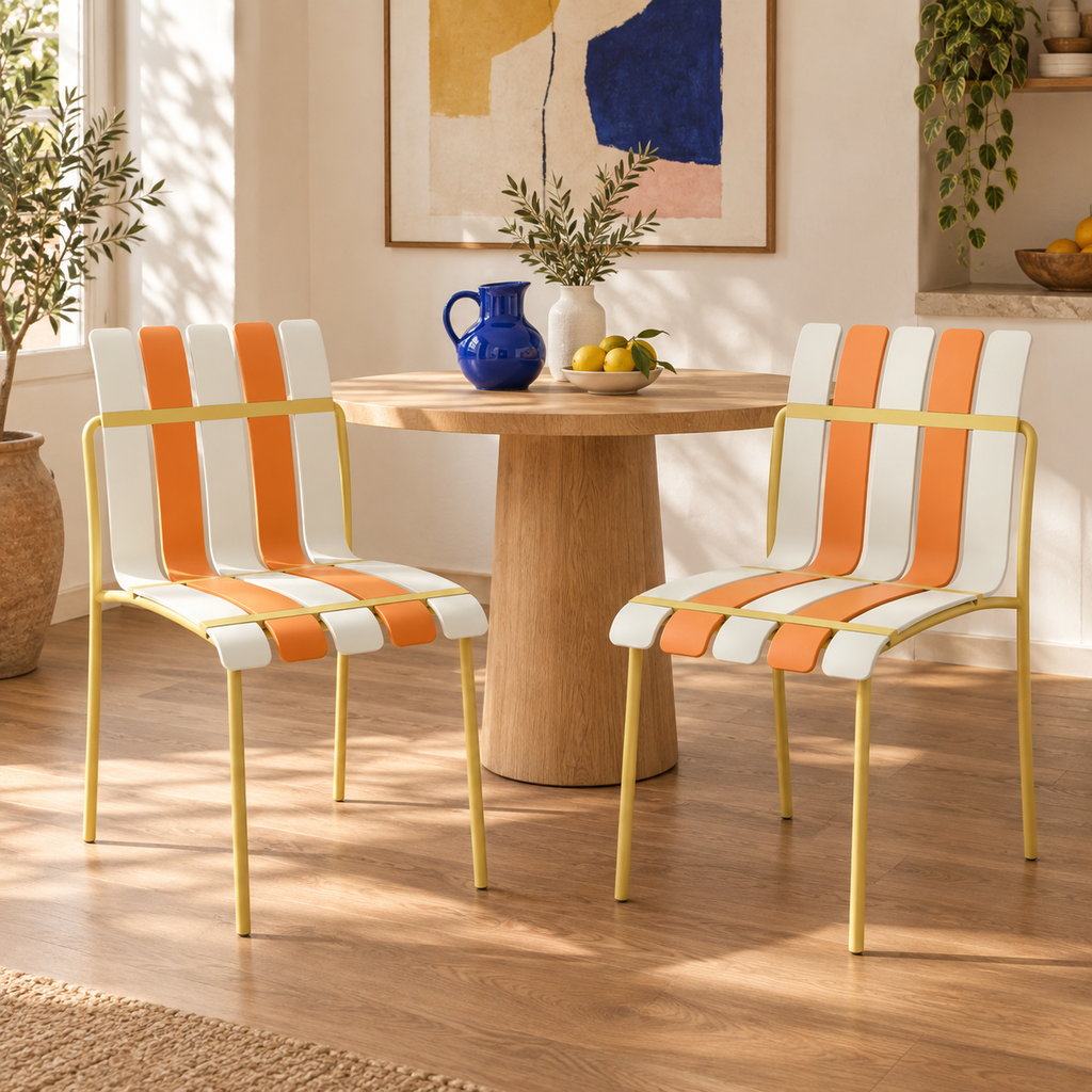 Two Ondara striped dining chairs, citrus, styled indoors; table and accessories not included