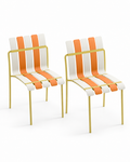 Two matching Ondara armless dining chairs in citrus on a white background