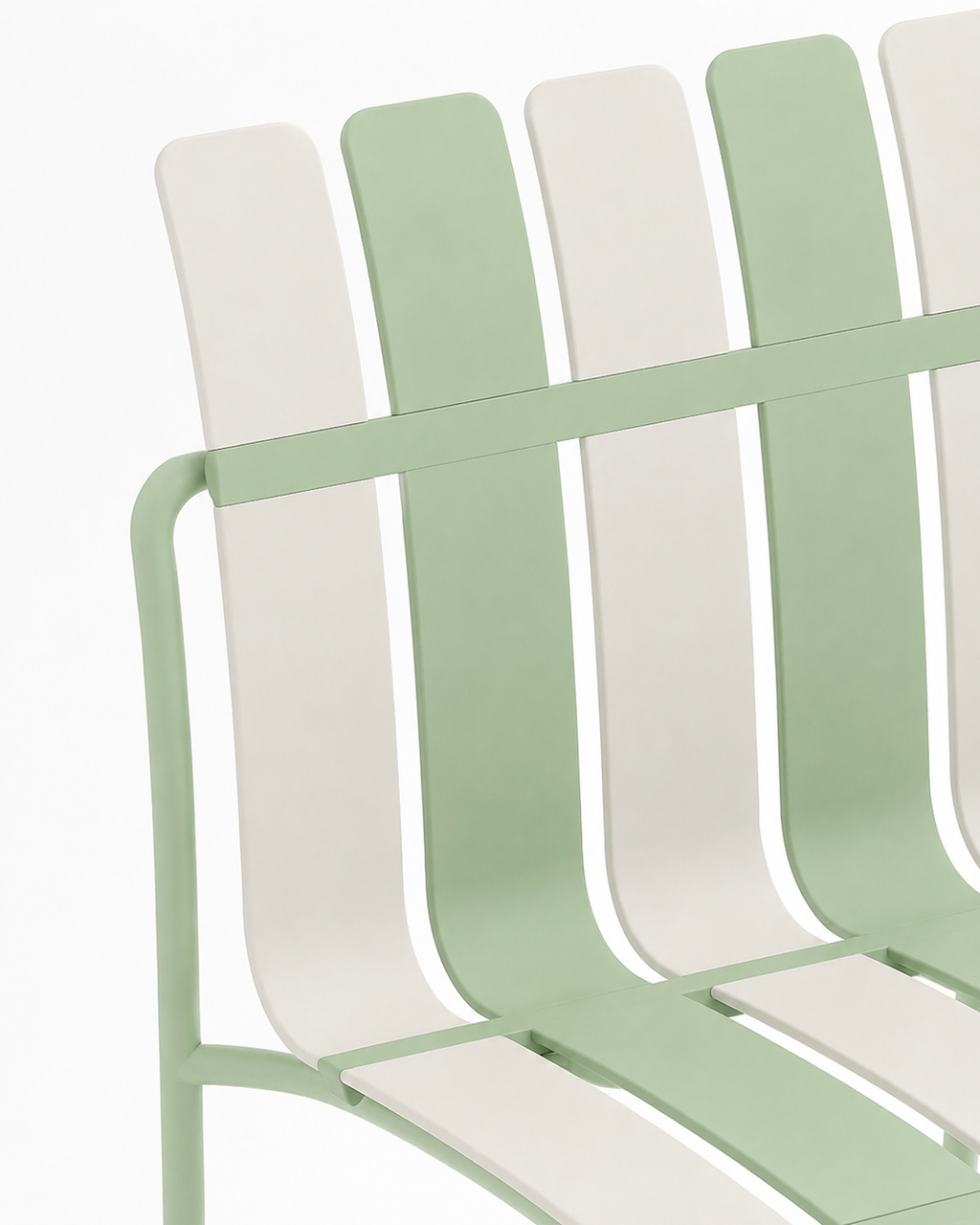 Close-up of the striped slats and metal frame of the Ondara dining chair in Sage Green & White