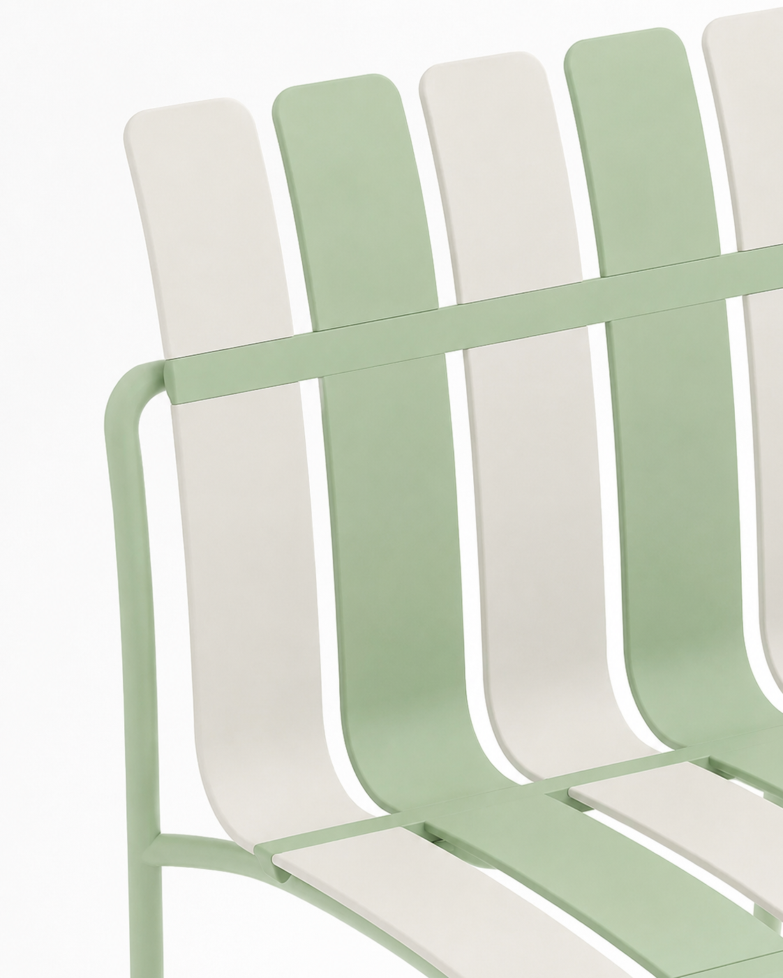 Close-up of the striped slats and metal frame of the Ondara dining chair in Sage Green & White